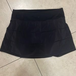 Lululemon skirt with built-in shorts. Size 6. Black